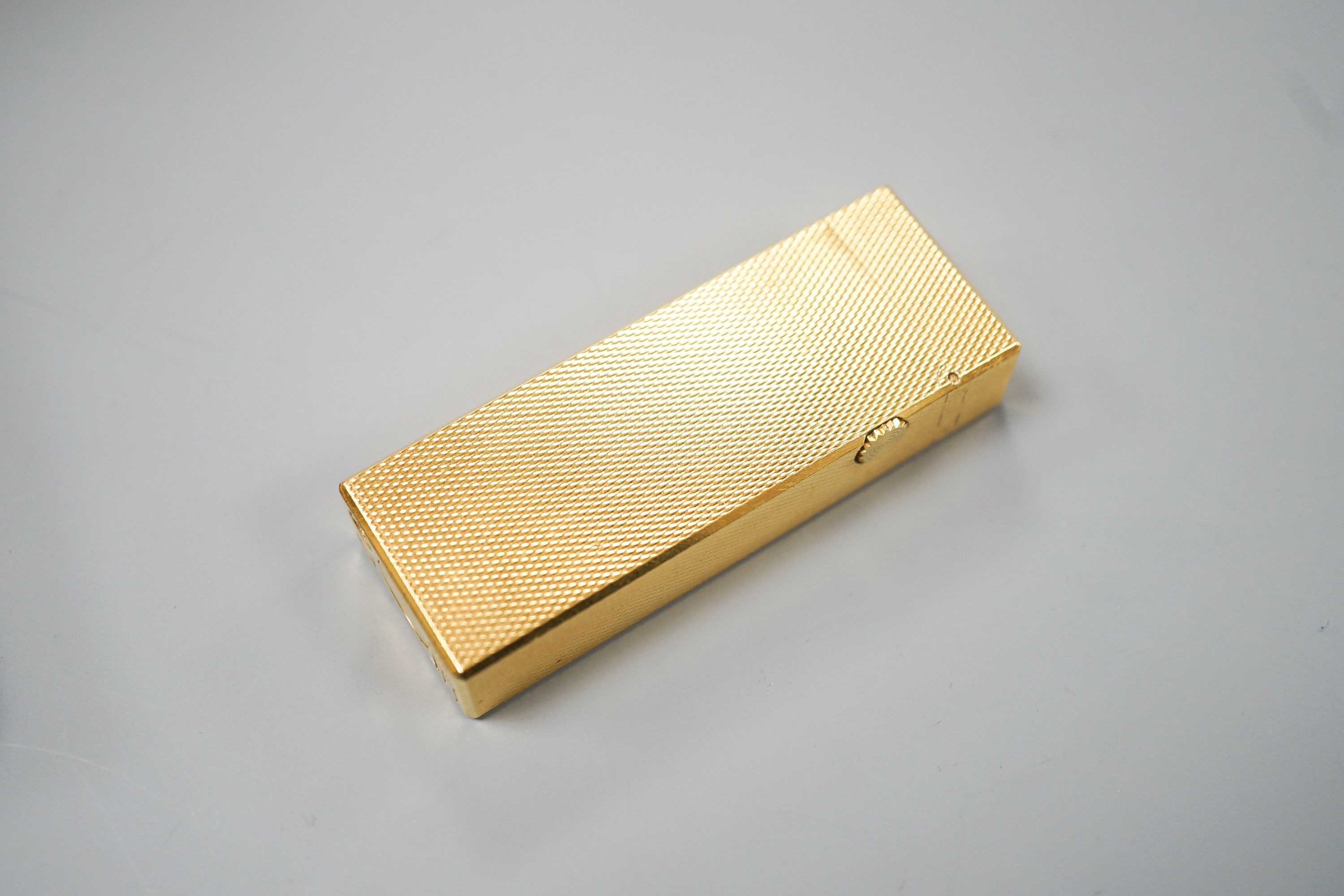 A cased Dunhill gold plated lighter